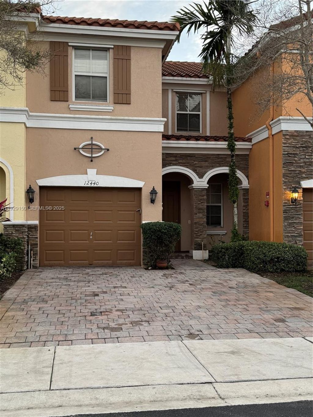 Photo of 12440 Emerald Creek Mnr #17, Plantation, FL 33325 (MLS # A11929150)