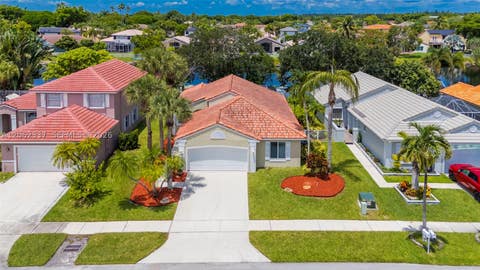 Photo of 2006 NW 182nd Ave, Pembroke Pines, FL 33029 (MLS # A12062337)
