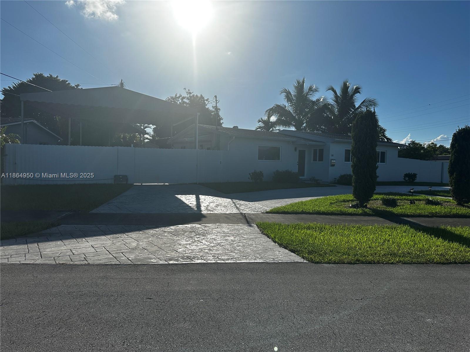 Excellent location, Beautiful, remodeled house with some amazing touches Situated in a corner lot with plenty of parking space. 3 Bedroom 2 bathrooms, spacious open concept. Big outdoor covered area that has an outdoor kitchen with a jacuzzi and a covered parking for a boat and or RV. Has fruit trees and a storage house. Motorized gate opening doors. Ready to welcome a new owner.