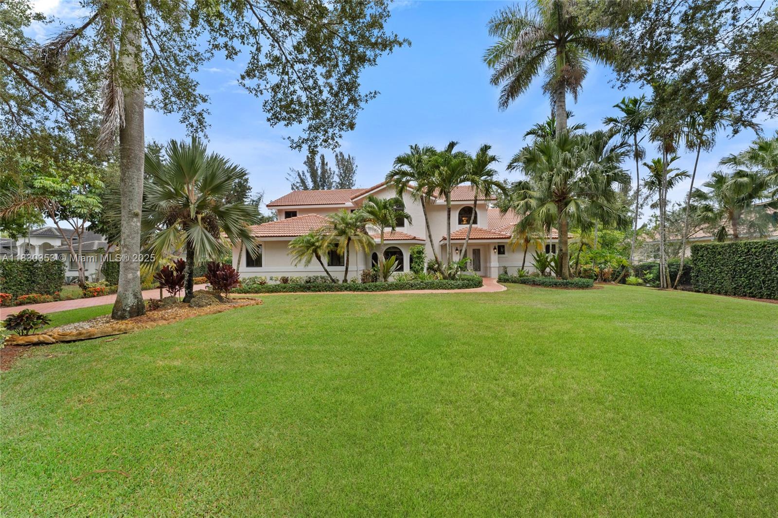 Priced Under Appraised Value & BEST PRICED 4-bed, 4-bath Home in the Heart of Plantation Acres! This 4,100+ sqft Estate sits on nearly an Acre of Lush Greenery. This Home was Thoughtfully Designed with Soaring Ceilings, a Grand Open Layout, Fully Remodeled Kitchen, Impact Windows/Doors, Full Cabana Bath, & Solar Panels for Low Energy costs. The Spacious Primary Suite features an addition that was Customized & Built out as Walk-In Closet & a Private Retreat area with Direct Access to the Pool Deck. Step outside to your own Backyard Paradise, showcasing a Heated Saltwater Pool, a Variety of Mature Fruit Trees & Space to Entertain! This is a Rare Opportunity to own in one of the Most Desirable Neighborhoods, Located near Top-Rated Schools including American Heritage- at an Unbeatable Value!