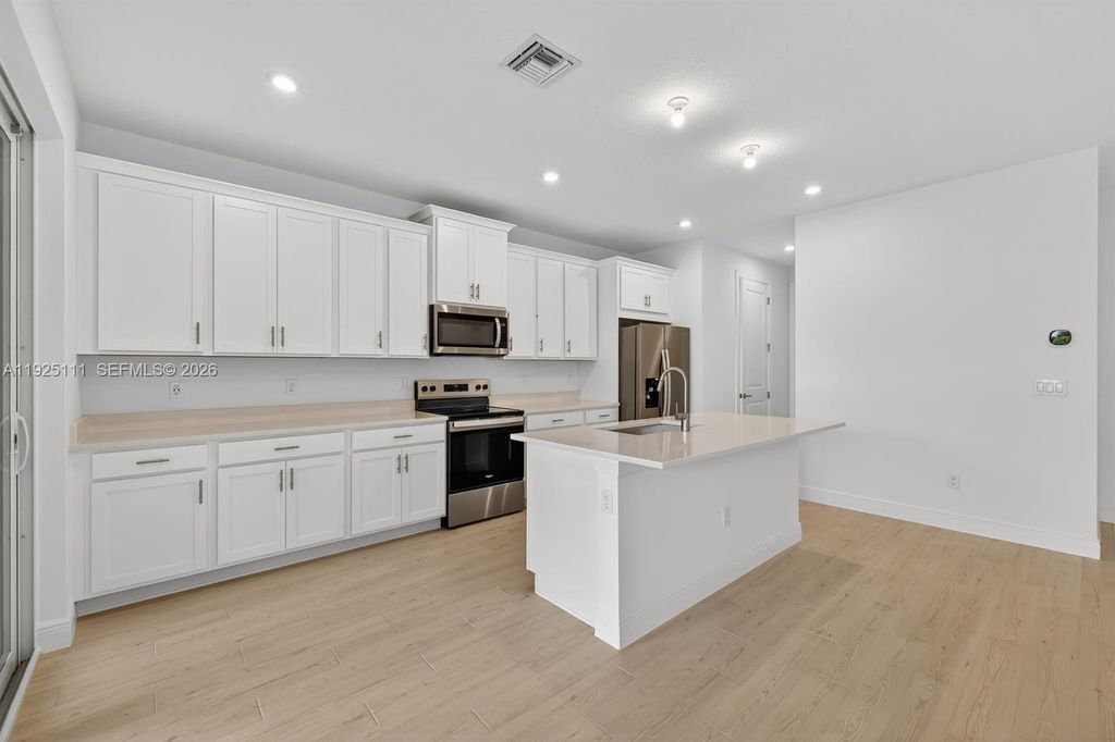 Photo of 3585 NW Solange Ct #3585, Jensen Beach, FL 34957 (MLS # A11925111)