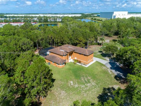 Photo of 13966 155th Pl N, Jupiter, FL 33478 (MLS # A11885395)