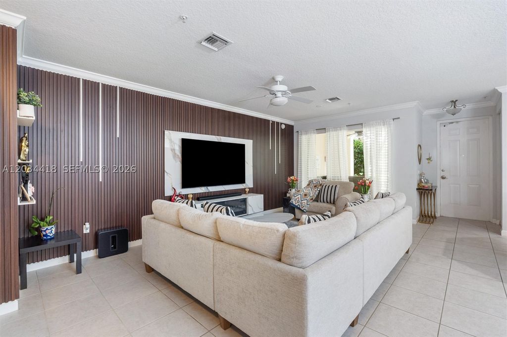 Photo of 2925 NW 126th Ave #105, Sunrise, FL 33323 (MLS # A12034418)