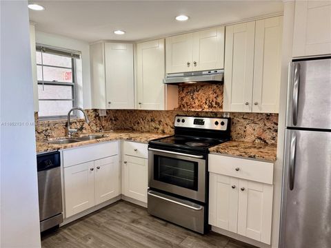Photo of 3100 W Rolling Hills Cir #310, Davie, FL 33328 (MLS # A11862131)