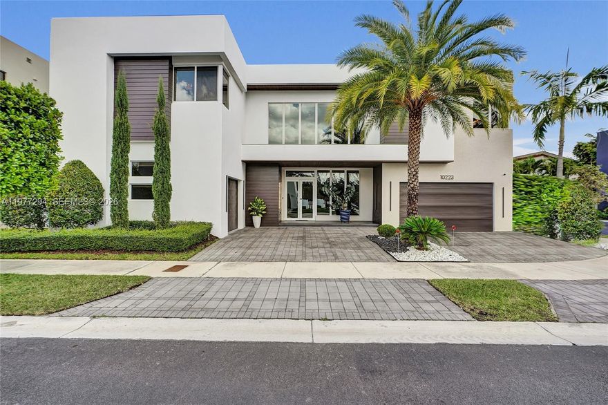 Step into elegance with this stunning corner-lot estat in the exclusive gated community of Modern Doral 75! This 5-bedroom, 5.1-bathroom masterpiece is designed for those who crave space, sophistication, and resort-style living. Features Include: OPEN FLOOR plan, 1 bedroom & 2 bath on the first floor and elegant interior architectural details, high ceiling, impact window & doors, Porcelanato floors on 1st floor and Wood Floors on 2nd floor and stairs, SMART HOME, Italian cabinetry, quartz counter tops and top of the line Stainless Steel appliances, AUTOMATIC CURTAINS and BLINDS, unique LIGHTING DESIGN, full SURROUND SYSTEM, game room, GAZEBO with BUILTIN BBQ. Club house with meeting areas, a fully equipped fitness center and children's playroom, media room and kitchenette, swimming pool, spa, sun deck, gazebo area and more.  Community Perks:Exclusive clubhouse with resort-style pool, Kids’ playroom & entertainment spaces, State-of-the-art fitness center, 24/7 gated security