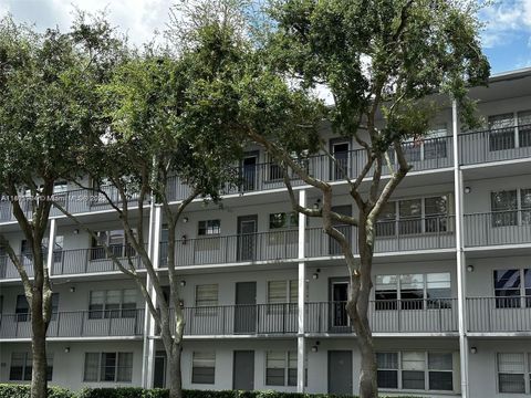 Photo of 400 SW 134th Way #406F, Pembroke Pines, FL 33027 (MLS # A11891904)