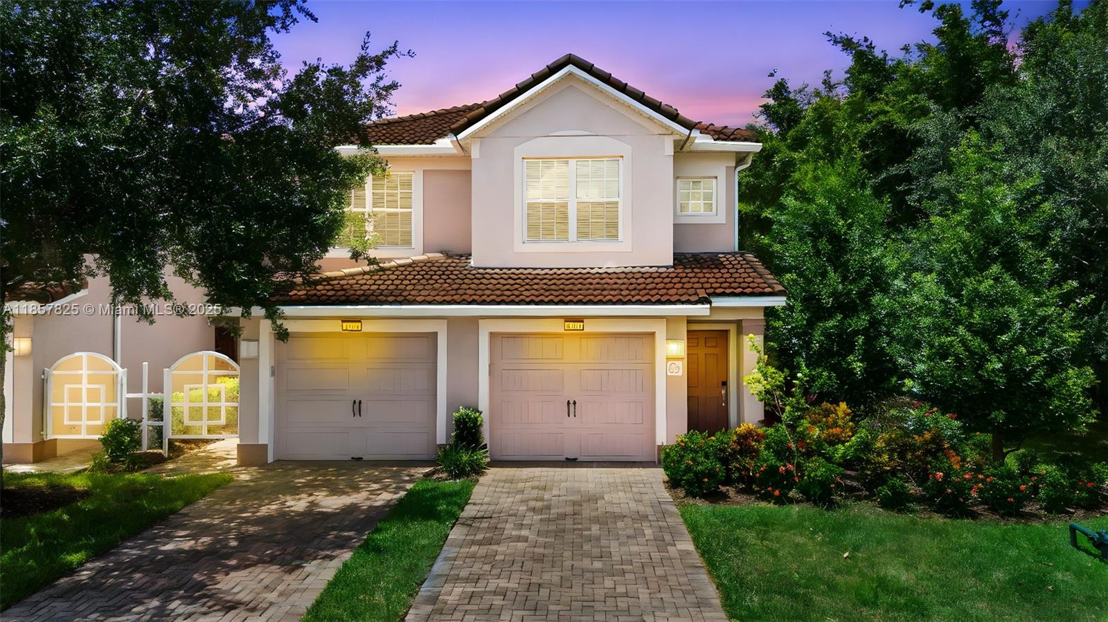 Perfectly located primary or vacation home close to everything! This beautifully maintained top-floor corner unit in gated Promenades Two at BellaTrae features vaulted ceilings, an open layout, dining area, breakfast nook, and spacious living room with stacked sliders leading to a large enclosed lanai overlooking peaceful bamboo trees. The primary suite offers a walk-in closet and dual-sink en-suite. A split floorplan adds privacy with a 2nd bedroom and large flex room (office or 3rd bedroom). Includes stainless steel appliances, full-size washer/dryer, and 1-car garage. Enjoy resort-style amenities: clubhouse, pool, spa, gym, tennis/pickleball, putting green, and more. HOA covers cable, internet, lawn, and pest control. Minutes to golf, dining, shopping, and theme parks!