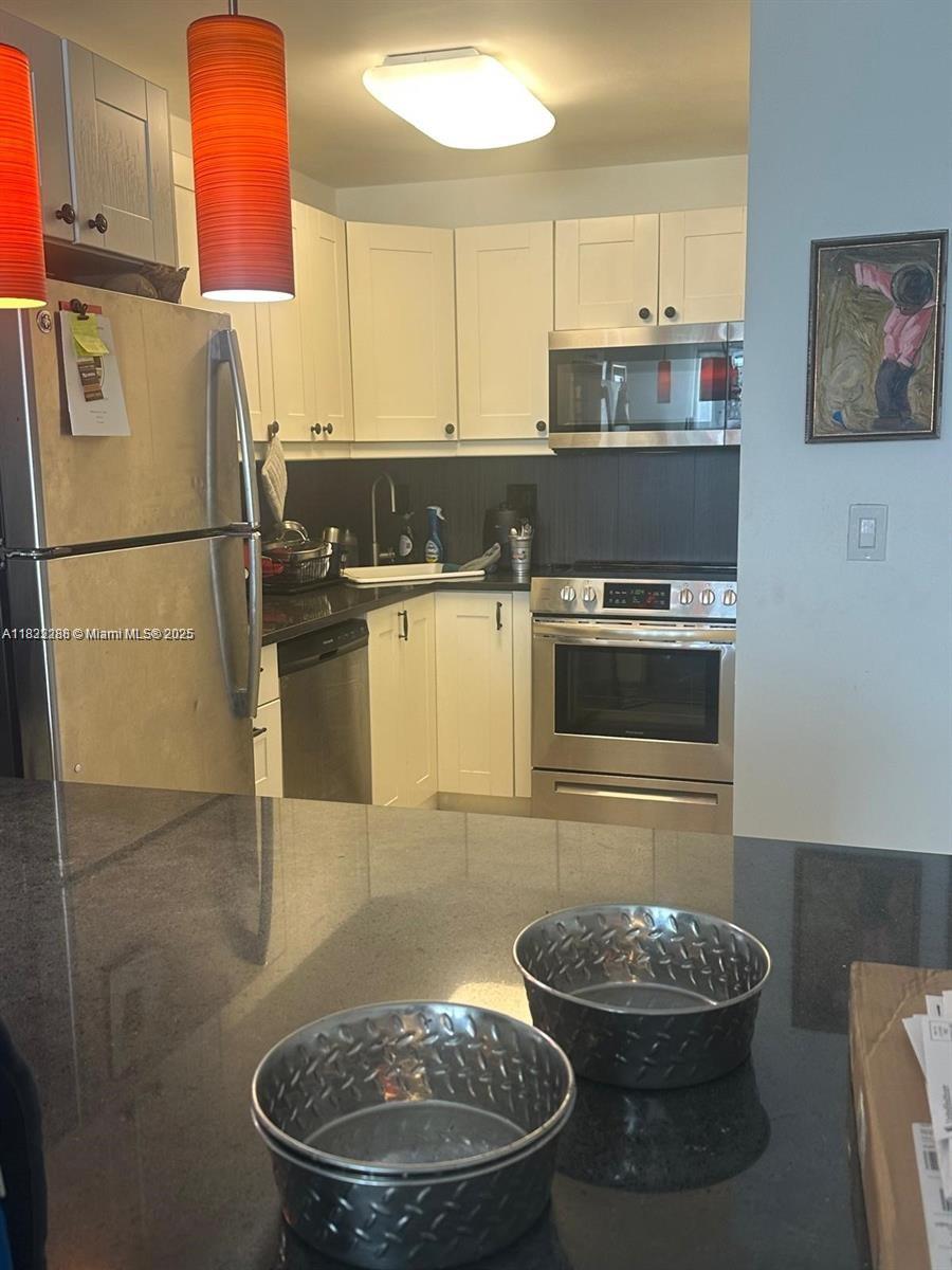 10230 Collins Ave 205