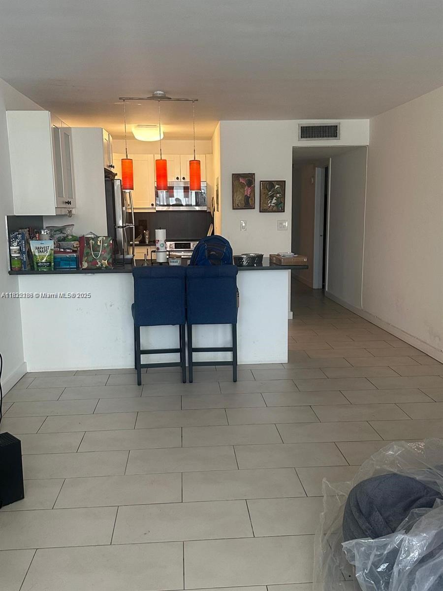 10230 Collins Ave 205