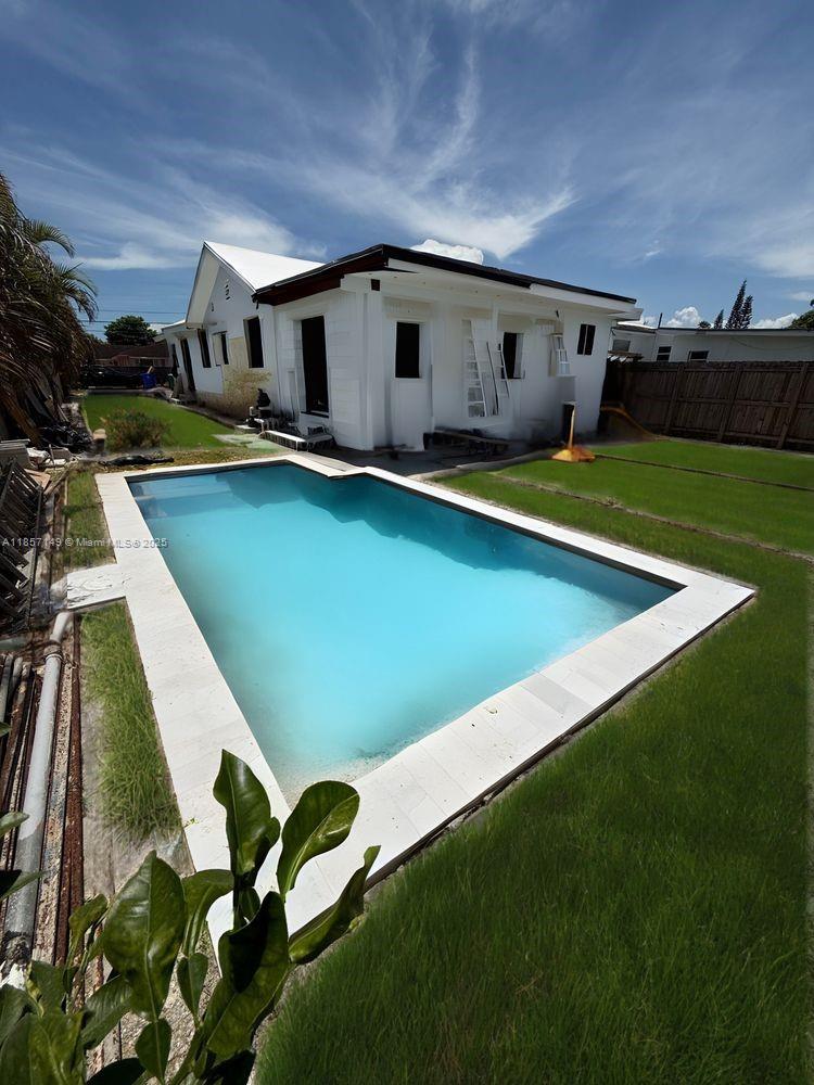 Renovation-In-Progress with Approved Plans & Permits!
Rare chance to take over a partially completed renovation in one of Miami’s top neighborhoods. Originally a duplex, it’s mid-conversion into a spacious single-family home — with approved plans, open permits, and major work already done. A brand-new permitted pool is in place, and all finishes, fixtures, and materials have been purchased and are on-site, ready for installation — saving time and avoiding material delays. Zoned T3-O for flexibility: continue as single-family or revert to duplex for rental income. Select photos are virtually renovated to show potential. Finish to your taste and maximize value in a high-demand area. Shown by appointment only.