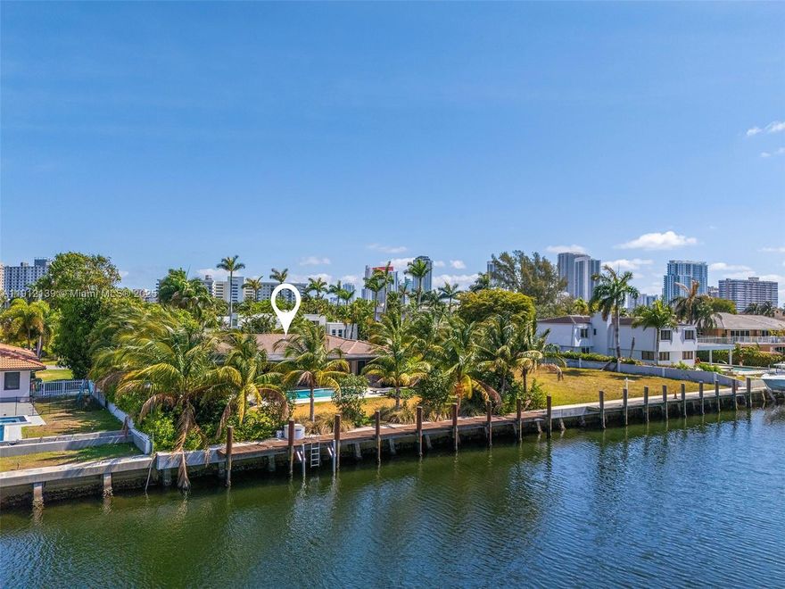 Waterfront Living in Golden Isles, beautifully remodeled one-story waterfront home, offering the ultimate South Florida lifestyle. Set on a large lot with 100 feet of deep-water frontage.  Perfect for boaters with a private dock, no fixed bridges and direct ocean access or those who simply enjoy waterfront living and outdoor entertaining. Inside, enjoy a bright 4BR/2.5BA, an open layout with contemporary finishes, porcelain floors, a modern kitchen, separate large bar, and spacious living, family, and dining areas. The backyard feels like a private resort — with a pool, covered terrace, sunken lounge area, lush landscaping, and outdoor bath and shower — southern exposure for relaxing in year-round sunshine. Circular driveway and two-car garage complete this exceptional home.