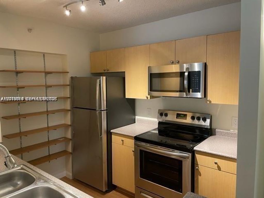 Photo of 1900 Van Buren St #220B, Hollywood, FL 33020 (MLS # A12013070)