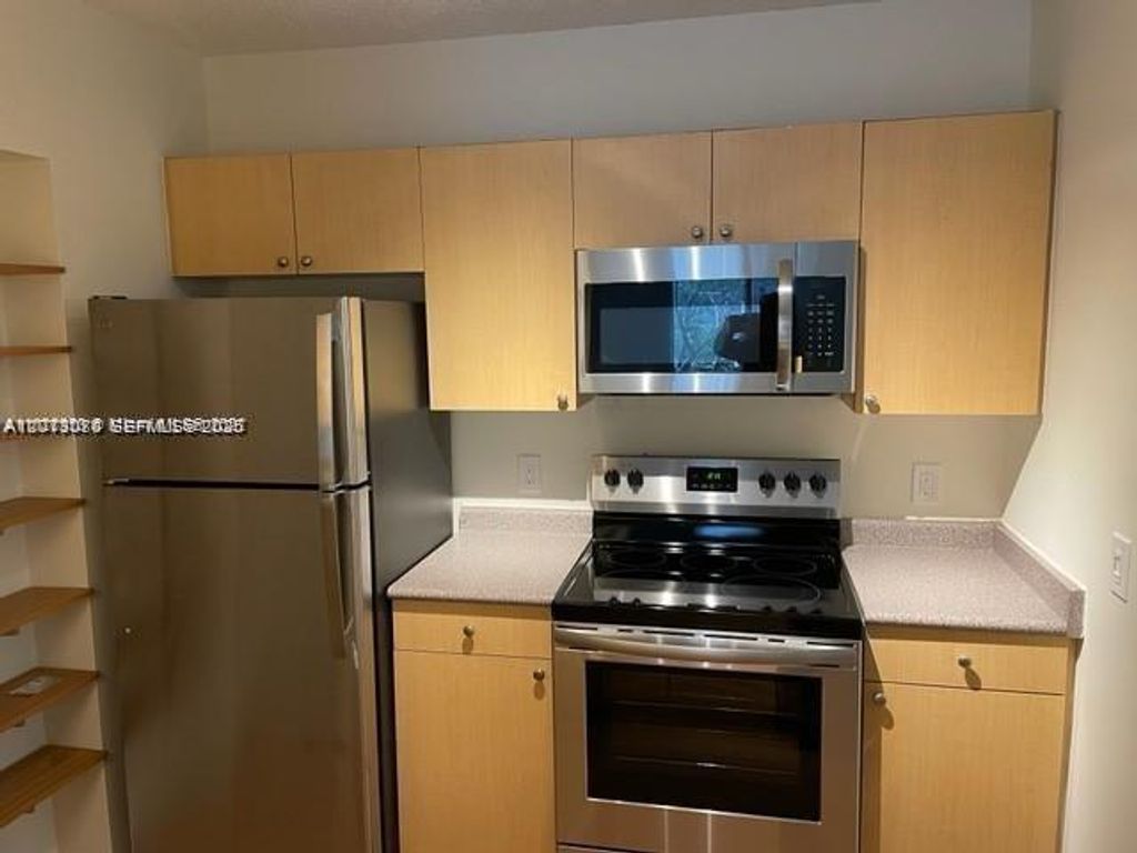 Photo of 1900 Van Buren St #220B, Hollywood, FL 33020 (MLS # A12013070)