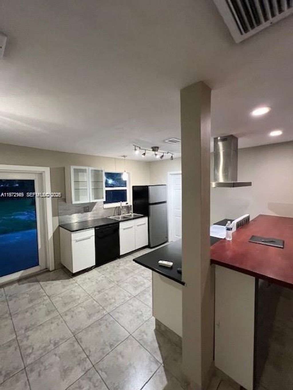 Photo of 5634 Madison St, Hollywood, FL 33023 (MLS # A11972169)