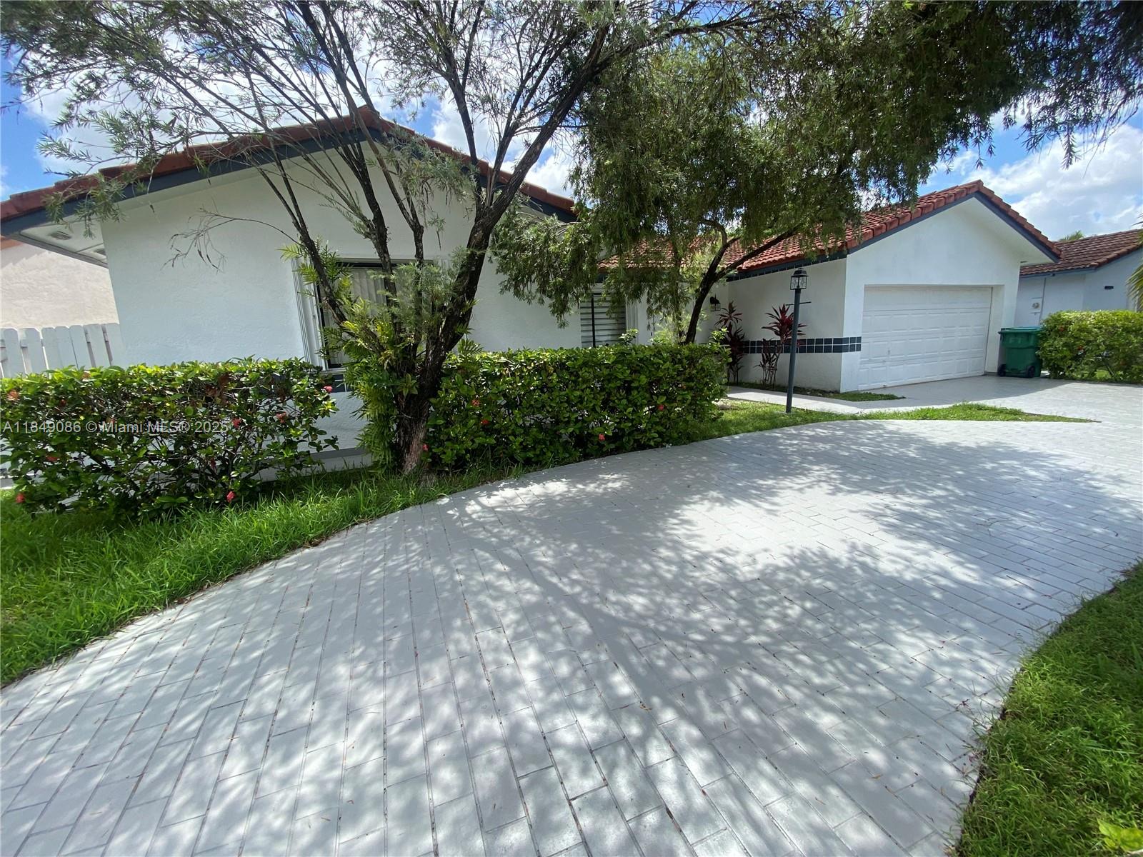 A Big ,beautiful home in IMMACULATE condition, in a great residential community. This home offers a spacious and bright living areas. A large master bedroom and huge family room that can be used as 4 bedroom. Tile throughout the whole house. New granite kitchen countertops and ceramic sinks on both bathrooms. Freshly painted inside and outside, accordion shutters. A large clean backyard with fruit trees . A double car garage. Closed to shopping centers, markets, parks and great schools. A DESIRABLE KENDALL NEIGHBORHOOD**** MOVE IN READY *****