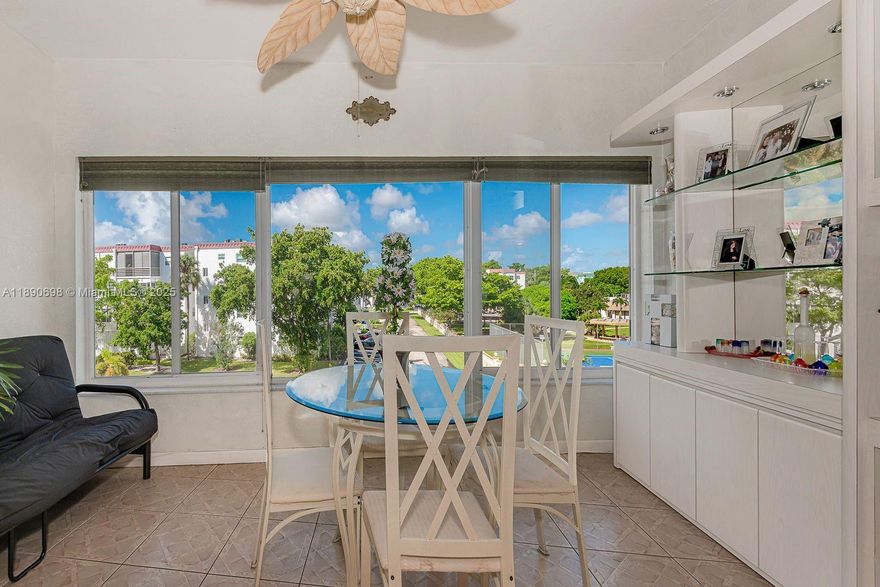 ***MOVE IN READY!! ***AMAZING CONDO IN OAKLAND ESTATES IN THE TOPAZ BUILDING COMES FULLY FURNISHED !! * VERY SPACIOUS LAYOUT * UPDATED 2 BEDROOM 2 BATH UNIT * TILED THROUGHOUT * DINING ROOM AND LARGE LIVING ROOM * LOTS OF CLOSETS FOR YOUR STORAGE NEEDS * ENJOY THE EXTRA LIVING SPACE WITH THE HUGE ENCLOSED BALCONY  WITH LARGE HURRICANE IMPACT WINDOWS WITH VIEW OF THE CLUBHOUSE AREA* THIS IS A 55+COMMUNITY OFFERING GREAT AMMENITIES HEATED POOL TENNIS THE CLUB ROOM AND FITNESS ROOM * EXCELLENT LOCATION CLOSE TO SHOPS AND MAIN ROADS * THIS COMMUNITY  INCLUDES A LITTLE OF EVERYTHING WHETHER YOU ARE LOOKING FOR A SEASONAL WINTER ESCAPE OR YEAR ROUND SOUTH FLORIDA LIVING !!