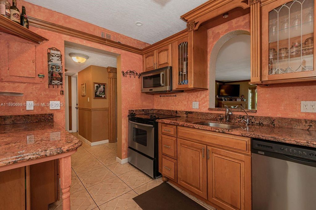 Photo of 3990 NW 42nd Ave #302, Lauderdale Lakes, FL 33319 (MLS # A11890698)