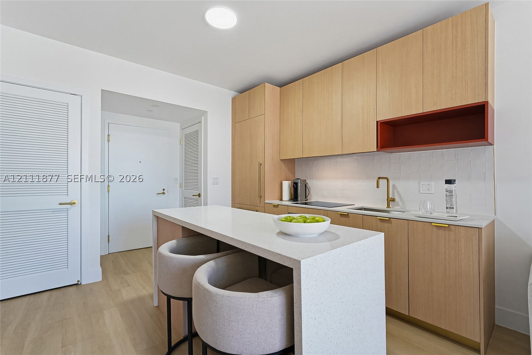 90 NE 32nd St 810