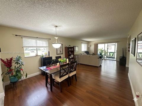 Photo of 1600 SW 127th Way #101C, Pembroke Pines, FL 33027 (MLS # A11998793)