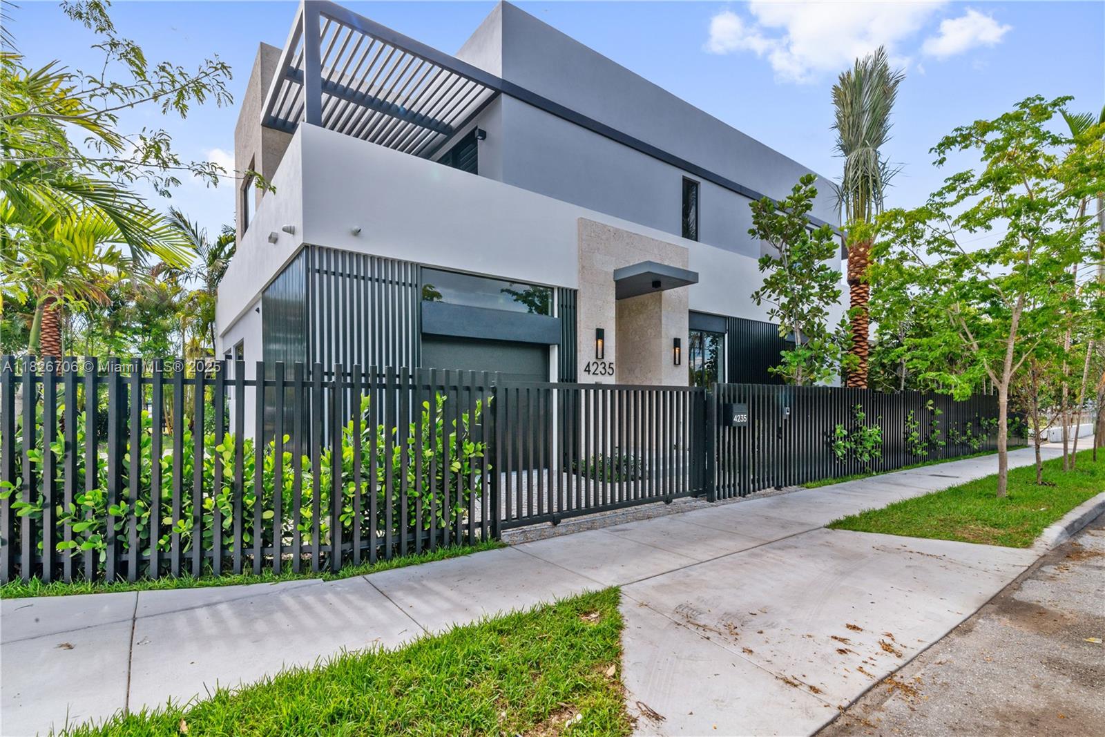 New Construction in Miami Design District. A rare modern gem in the heart of the Design District. This 5-bed, 5.5-bath home offers 5,326 SF with 4,062 SF of sleek interiors and seamless indoor-outdoor living. Enjoy a summer kitchen, pool, and multiple terraces perfect for entertaining.
Features include custom closets, a grand primary suite, impact windows, European tile, matte black fixtures, and a chef’s kitchen with quartz counters and premium Viking, Wolf & Subzero appliances. Smart tech throughout: Nest, Lutron, speakers, security, and MyQ garage.
Steps from Buena Vista, Wynwood, world class shopping and dining in design district.