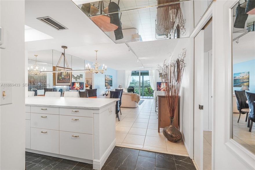 East Boca living just 1 mile from the beach. This bright 1,300 SF condo features 2 large bedrooms plus an open den that can easily be converted into a third bedroom, home office, or guest space, exceptional flexibility at this price point.The home offers an upgraded open-concept kitchen, a dedicated laundry room with full-size washer and dryer, and a spacious screened balcony overlooking the pool. Large windows and sliding doors bring in abundant natural light, including in the primary suite, which includes a walk-in closet.All-ages community with pool and BBQ area. Ideally located near shopping, dining, FAU, Mizner Park, and Delray Beach’s Atlantic Avenue. Small pets allowed (per association,6100 building only).