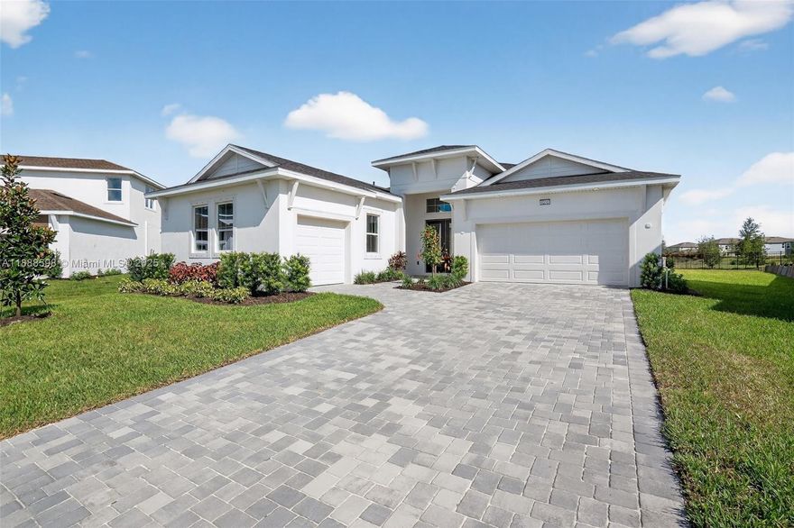 Be the first to occupy this brand new incredible 3 bed 2.5 bath home on a 15,000 sq ft cul-de-sac lot with direct pond frontage. A stunning foyer with 12’ ceilings welcome you, opening up to a generously sized great room with tray ceiling feature and 16’ glass sliders leading to a paver lanai with summer kitchen pre-wire. An oversized gourmet kitchen with expansive island and luxurious flat paneled cabinetry flows into a charming morning kitchen and incredible walk-in pantry. The master retreat showcases a generously appointed Roman Shower with dual shower heads. Additional features include: 10’ ceilings, upgraded 9” beveled White Oak LVP floors, 8’ doors and wall mounted TV outlets. With all comparable lots already sold, this is the sole opportunity available at this price point.