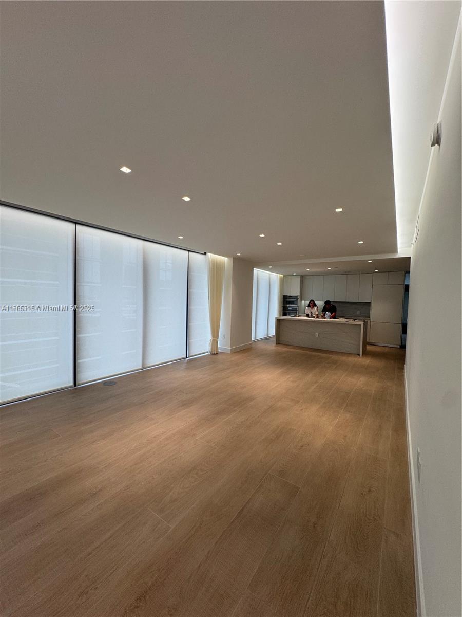 Step into elevated living at Aria Reserve, where this residence offers refined interiors and breathtaking bay views in one of Edgewater’s most prestigious towers. This stunning corner has ALL THE UPGRADES YOUR NEED. 4 beds + 5.5 Baths + Den WITH A Floor to ceiling window with the option to turn it into a 5th bedroom. Upgraded wood like ceramic floors, custom walk in closets and window treatments including Blinds, black outs and Drapes. Upgraded Kitchen counter and backsplash. LED - Integrated mirror and frameless shower doors in bathrooms. Frameless doors in all bedrooms as well as custom soffits. Living room featuring drop ceiling with cove lighting and deamable spot lights.
This unit included 2 parking space.