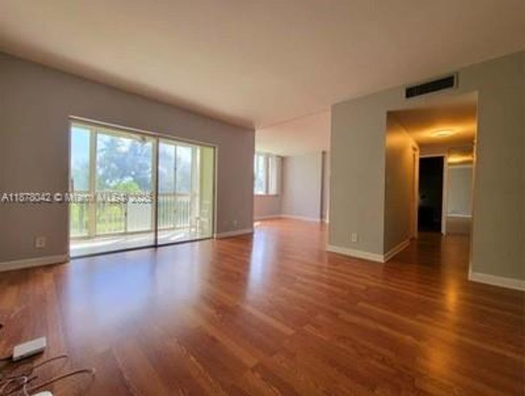 Photo of 4200 Hillcrest Dr #303, Hollywood, FL 33021 (MLS # A11878042)