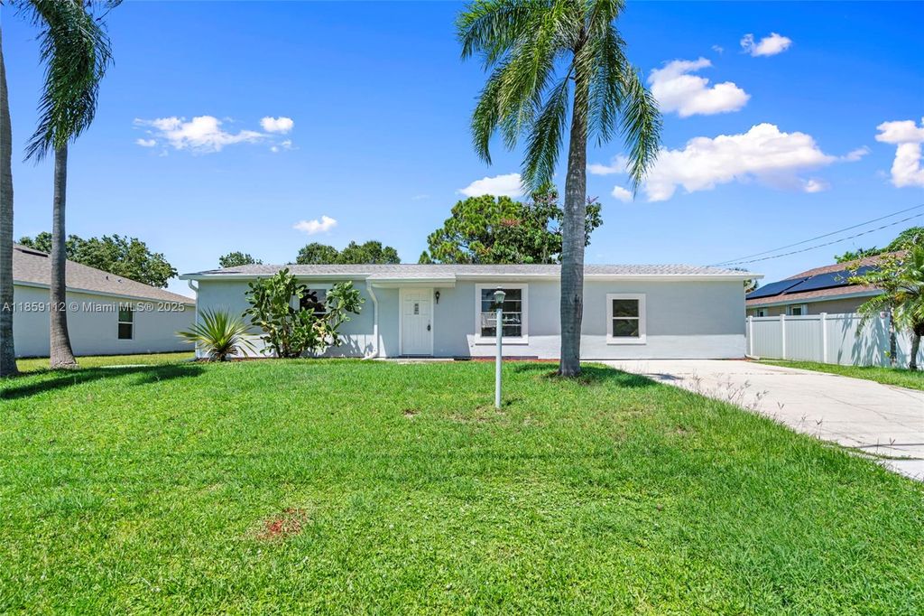 Photo of 711 NW Riverside Dr, Port St Lucie, FL 34983 (MLS # A11859112)