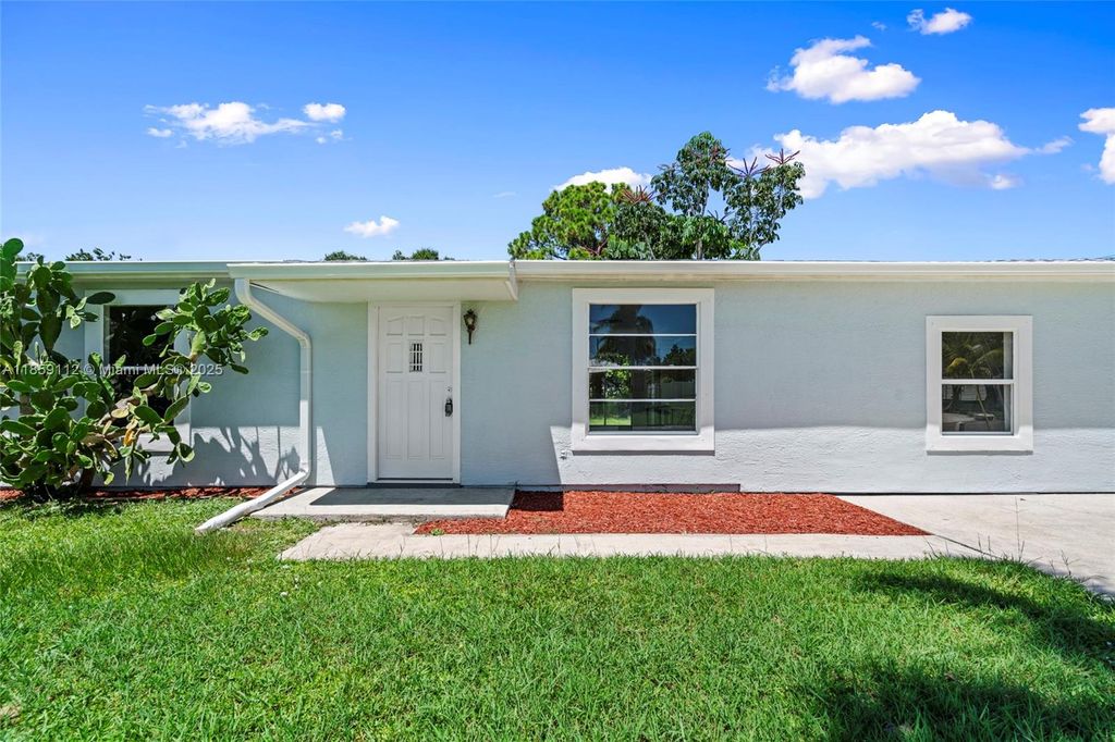 Photo of 711 NW Riverside Dr, Port St Lucie, FL 34983 (MLS # A11859112)