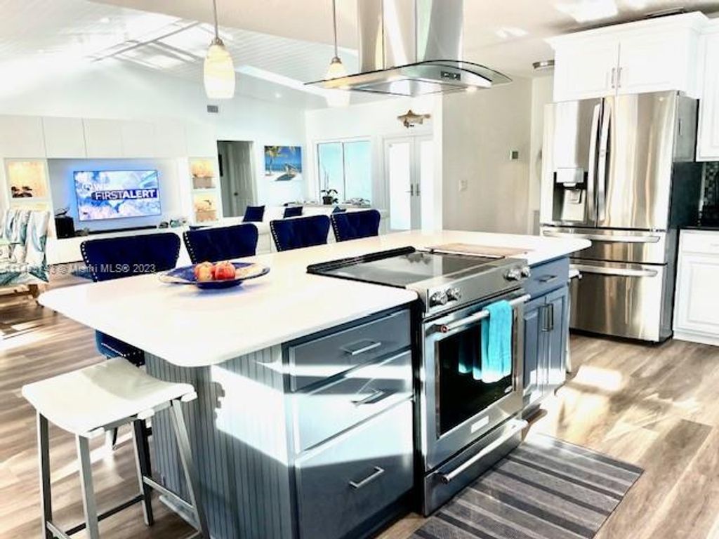 Photo of 2914 NE Rosetree Dr, Jensen Beach, FL 34957 (MLS # A11493743)