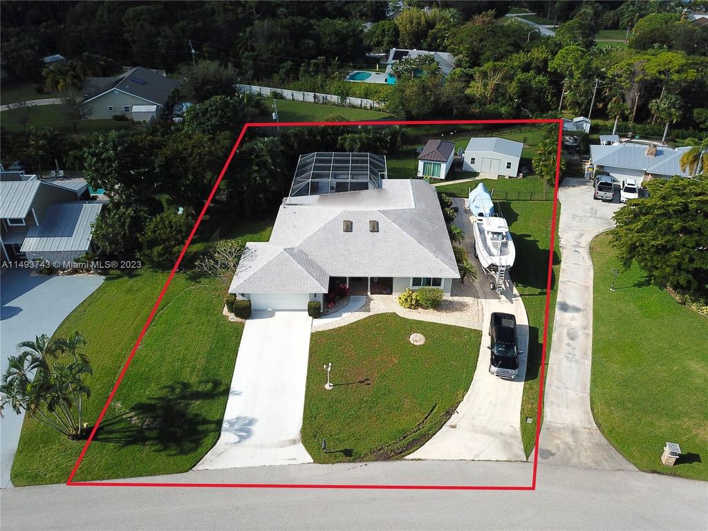 Photo of 2914 NE Rosetree Dr, Jensen Beach, FL 34957 (MLS # A11493743)