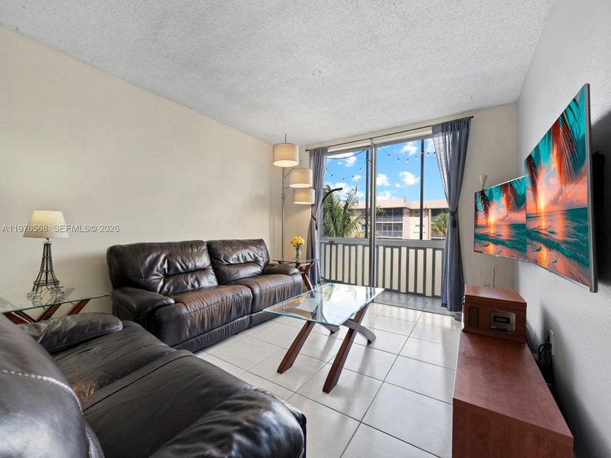 Enjoy tranquil living in this rarely available 3 bed, 2 bath corner unit in Ludlum Lake Condominium. Walk into an oversized living area, fit for your personal design. This is a super spacious unit boasting a freshly painted, well-kept interior. The primary bedroom hosts a large walk-in and ensuite. Step out onto your balcony and relax after a long day, while enjoying the serene water views. Balcony was recently re-screened. Complete accordion shutters throughout. Laundry is just steps away on the same floor. Private corner unit with only 1 next-door neighbor. Building equipped with an elevator. Conveniently located right off the Palmetto Expressway and close to Miami Lakes’s cherished Main Street, with plenty of shopping and restaurants. Association fee is $356.59 monthly. Water is included. This unit comes with 3 parking spaces (1 assigned, 2 first come first served).