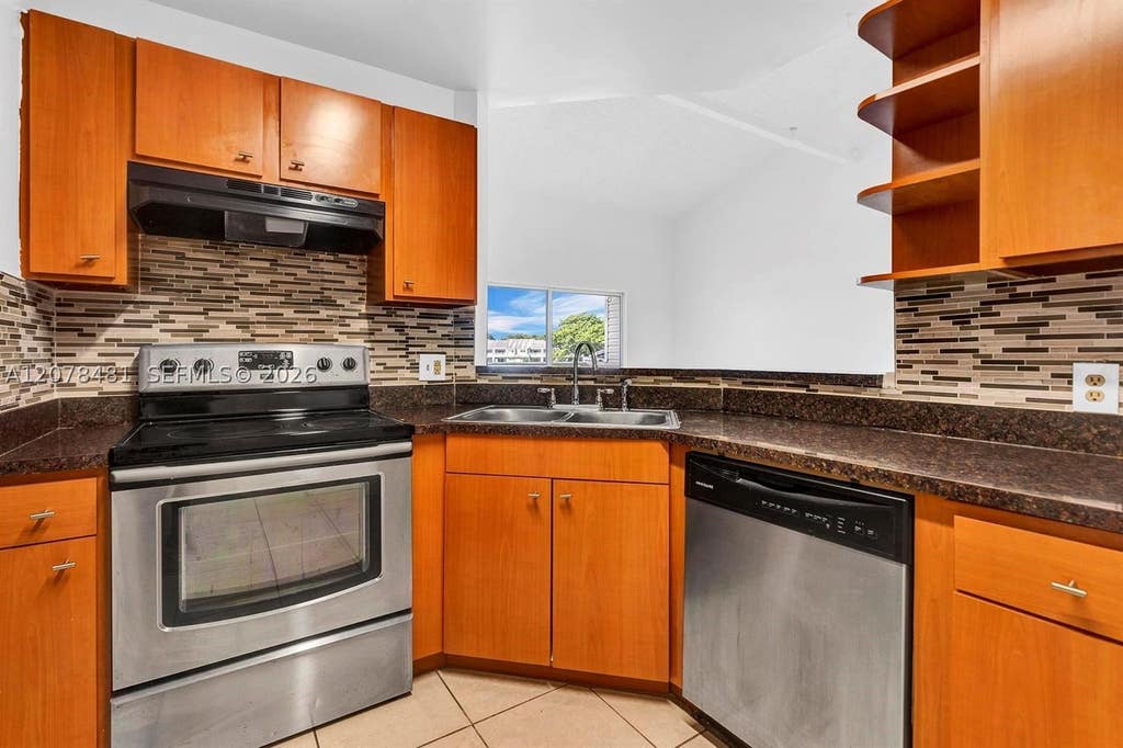 Photo of 3449 NW 44th St #205, Oakland Park, FL 33309 (MLS # A12078481)