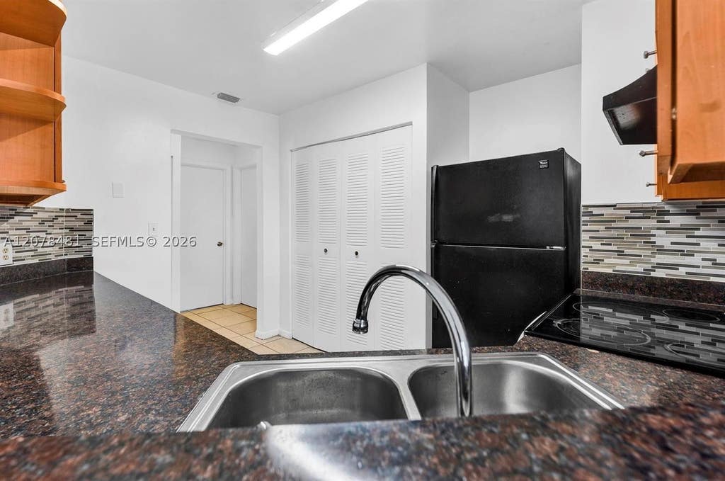 Photo of 3449 NW 44th St #205, Oakland Park, FL 33309 (MLS # A12078481)