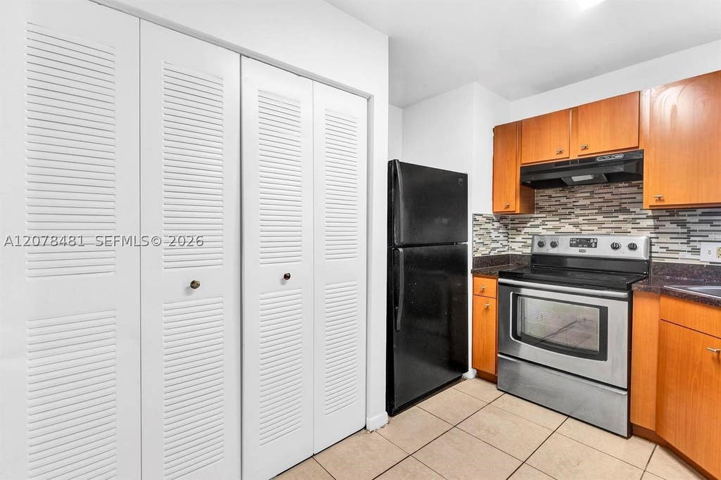 Photo of 3449 NW 44th St #205, Oakland Park, FL 33309 (MLS # A12078481)