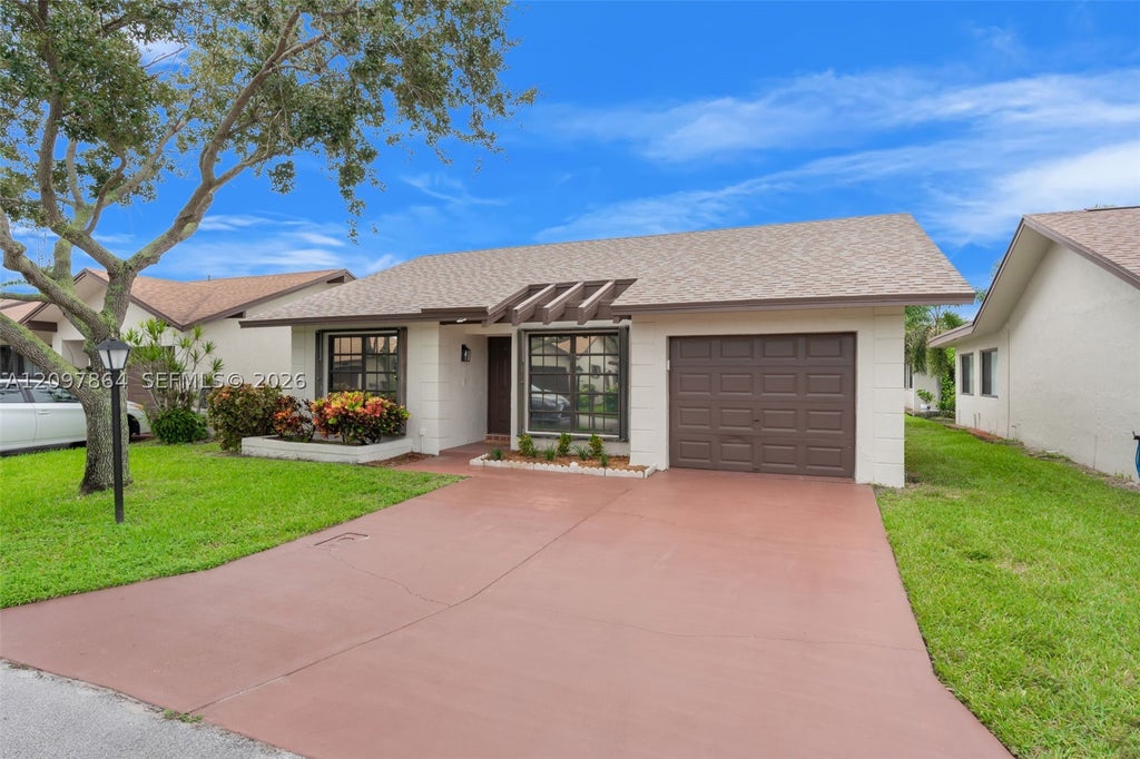 Photo of 1563 SW 22nd Ter, Deerfield Beach, FL 33442 (MLS # A12097864)