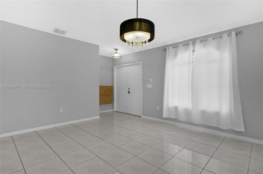 Beautifully maintained and move-in ready home in the heart of Hialeah Gardens! This spacious 3-bedroom, 2-bath residence offers approximately 1,350 sq. ft. of comfortable living space with a well-designed layout. Enjoy a bright formal living and dining area, plus an additional family room—perfect for relaxing or entertaining.  The split floor plan provides privacy, with the primary suite separated from the other two bedrooms and bathroom. Ample closet space throughout, including additional hallway storage. Freshly painted and meticulously kept, this home is truly turnkey.  Step outside to a large screened-in porch ideal for outdoor living, along with a fully fenced backyard and side areas. The property features a low-maintenance exterior with a convenient wraparound walkway. Spacious driveway with parking for 4+ vehicles.  No HOA approval required—fast and easy move-in!