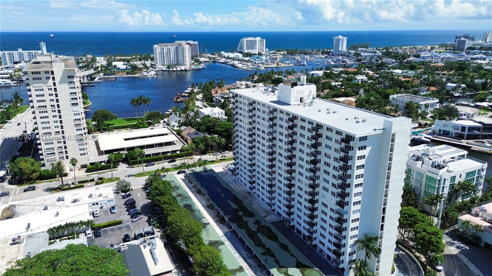 Stunningly renovated 1-bed, 2-bath condo with breathtaking ocean, Intracoastal, and city views! Located in a fully updated boutique building, this spacious unit features updated quartz counters, stainless steel appliances, and custom Italian plaster in the living room. Bathrooms are elegantly redesigned with high-end finishes. Just steps to Las Olas Blvd and a short walk to the beach, surrounded by fine dining, luxury shopping, and nightlife. Building has completed 40-year certification and full renovation with a gorgeous lobby, state-of-the-art fitness center, library, community room, heated pool, and tiki bar with two built in grills. HOA includes cable, internet, water, and fiber TV. Extra storage, covered parking, 24-hr security. Pets allowed