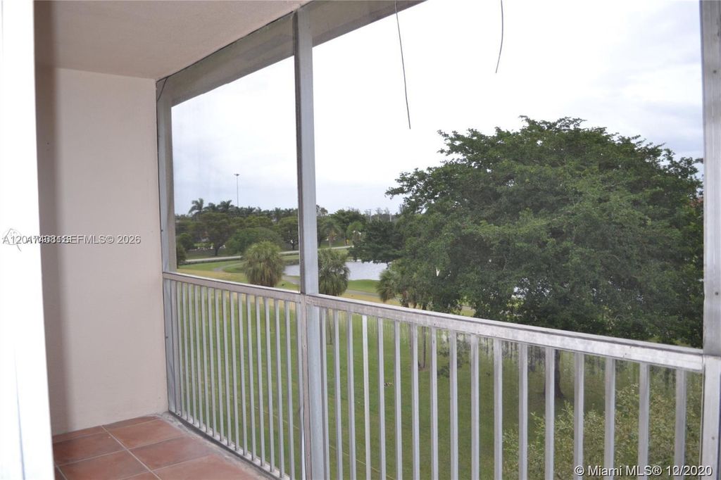 Photo of 101 SW 132nd Way #415J, Pembroke Pines, FL 33027 (MLS # A12017438)