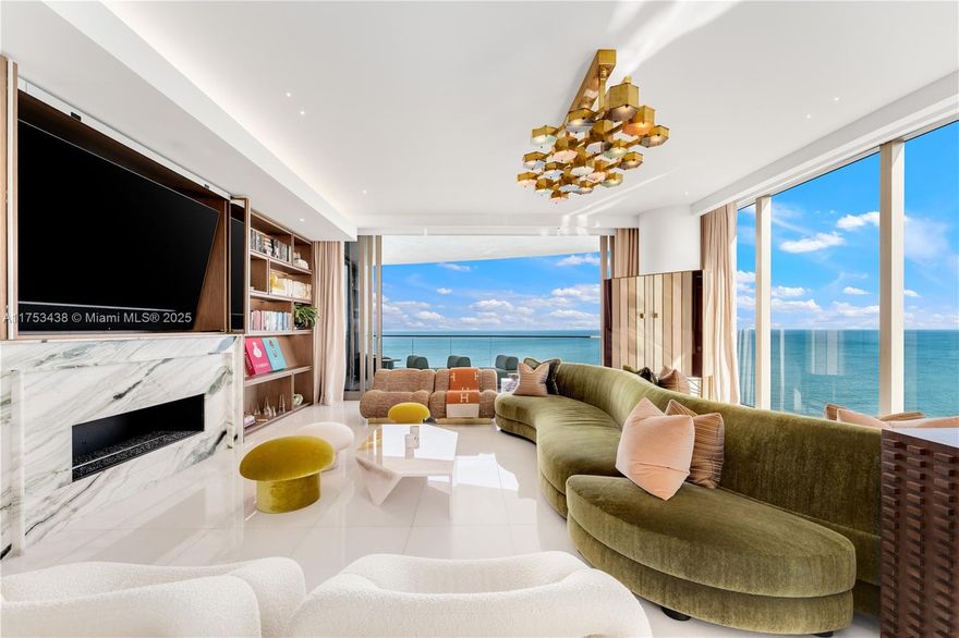 Experience unrivaled luxury at The Estates at Acqualina in this meticulously crafted 4-bed, 5.5-bath residence, offering breathtaking ocean & city views in Sunny Isles Beach. This sky-high sanctuary features a private elevator foyer, a chef’s kitchen w/ Wolf appliances, & a summer kitchen on the terrace. Significantly upgraded w/ top-level interior design, this rare 01-line layout offers more expansive living areas compared to the typical 5-bed configurations. The lavish primary suite boasts his-&-her baths & expansive custom walk-in closets, all framed by sweeping ocean vistas. Indulge in 45,000 SF of world-class amenities, including an ice-skating rink, bowling alley & resort-style pools. Just steps from the beach, embracing a vibrant and sophisticated oceanfront lifestyle.