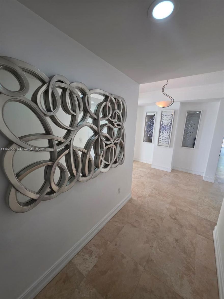 Welcome to this stunnning corner residence with 1,950 sq.ft. It is filled with natural light and designed for comfort and style. The open-concept layout features a beautiful foyer that leads to a large living and dining area with marble floors and impact windows. The kitchen is a dream- equipped with granite countertops, custom cabinetry, ss appliances, and a convenient breakfast bar. Enjoy indoor-outdoor living on the wraparound balcony with plenty of room. Located just two blocks from Deerield beach Pier, just steps away from the ocean, restaurants, and boutique shops. Includes one assigned parking spaces and secured lobby. Pets welcome w/ restrictions. Available for 6 or 12 month rental terms. Includes a Deluxe Membership (seating for two with umbrella or cabana hood). Easy to show!