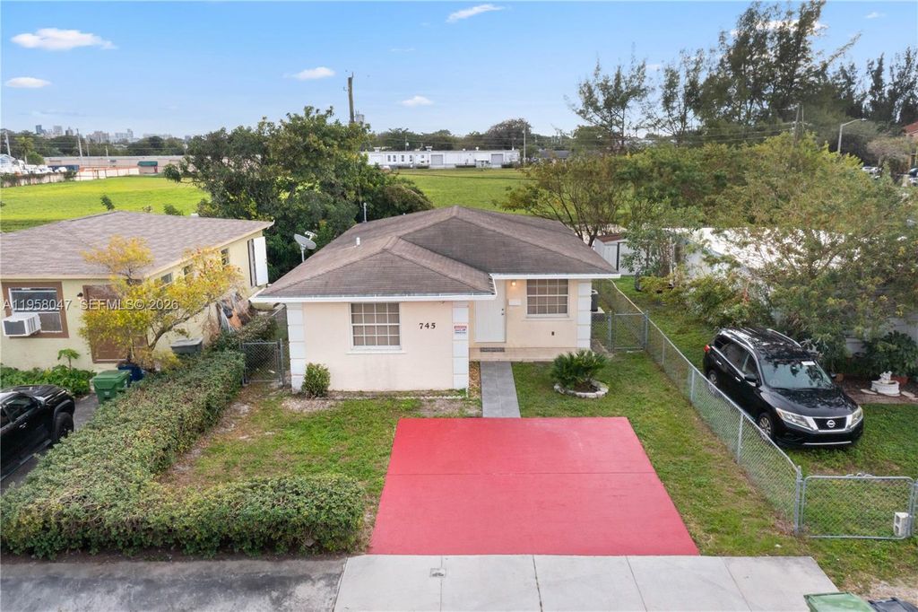 Photo of 745 NW 3rd Ct, Hallandale Beach, FL 33009 (MLS # A11958047)