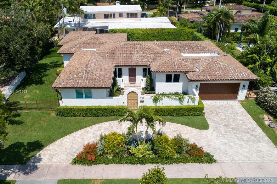 Sophisticated and charming, single-story, 4 bdrm/3 bath home within the Golden Triangle of Coral Gables. Extensively updated with 3000 adj. sq. ft., on a 10,900 ft. lot features a beautiful courtyard entry, impact doors/windows. There is a new 2020 gourmet, eat-in kitchen with top-of-the-line appliances, and a sunny breakfast area. Formal living and dining rooms plus a cozy Family room. To the left of the living room are all the bedrooms. The spacious master has walk-in closets and French doors to the patio/pool that features an infinity fast-lane resistance machine. The pool can be seen through French doors from many rooms in the house. The 2-car garage has a Clopay door and epoxy floors. Separate laundry room with a built-in desk/office area and a Standby generator. FIRM PRICE.