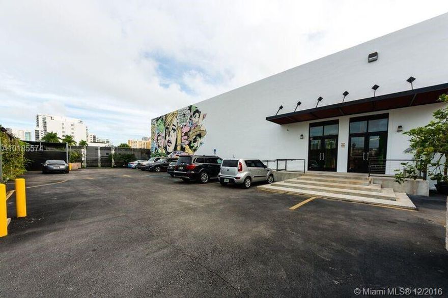 Exquisite spatial canvas for creative and industrial use located in the center of the highly sought after Wynwood district, home to Miami's cultural explosion, consisting of a large post industrial space flooded with natural light and expertly finished throughout. Cutting edge security system, three loading docks, and plenty of work and development space provide alternatives for the new owners. No sign on property