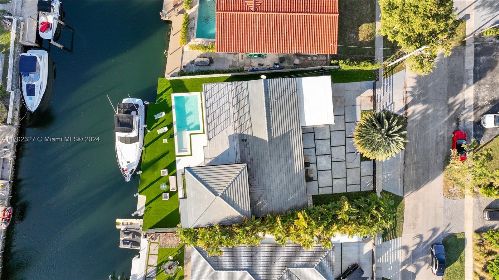 Stunning fully renovated waterfront home on prestigious Keystone Island! This two-story property offers ocean access and a private deck, perfect for docking your boat. The first floor features a master bedroom and three additional bedrooms, while the second floor boasts an additional master suite for ultimate privacy. Enjoy the newly constructed pool and modern finishes throughout. Furniture purchase is optional, making it easy to transition into your dream waterfront lifestyle. A rare opportunity in one of North Miami's most sought-after locations!