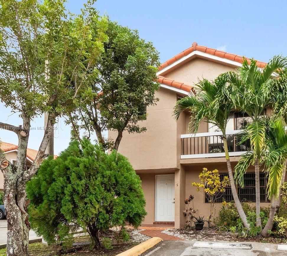 Prime corner townhouse with 1,610 sq ft of fully remodeled living space! Featuring 3 spacious bedrooms, 2.5 bathrooms, abundant closets, and storage throughout. Enjoy a private backyard perfect for gatherings, pets, and play. Bright interior with laminate floors, new closet doors, and remodeled kitchen with granite countertops and brand-new stainless steel appliances. Additional upgrades include a new washer and dryer and A/C installed in 2022. Flexible downstairs layout ideal for dining, family, or formal living areas. Perfect for families or students. Conveniently located near FIU, International & Dolphin Malls, Miami Int'l Airport, major expressways (836, Turnpike, Palmetto), shopping, and dining.