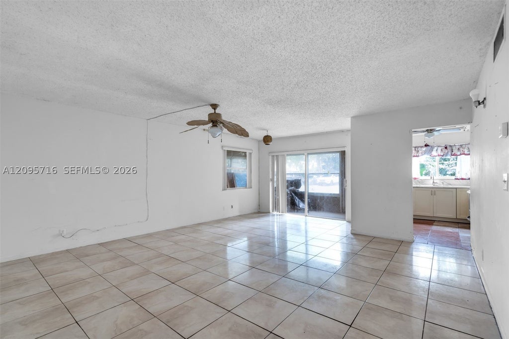 Photo of 4047 NW 16th St #107, Lauderhill, FL 33313 (MLS # A12095716)
