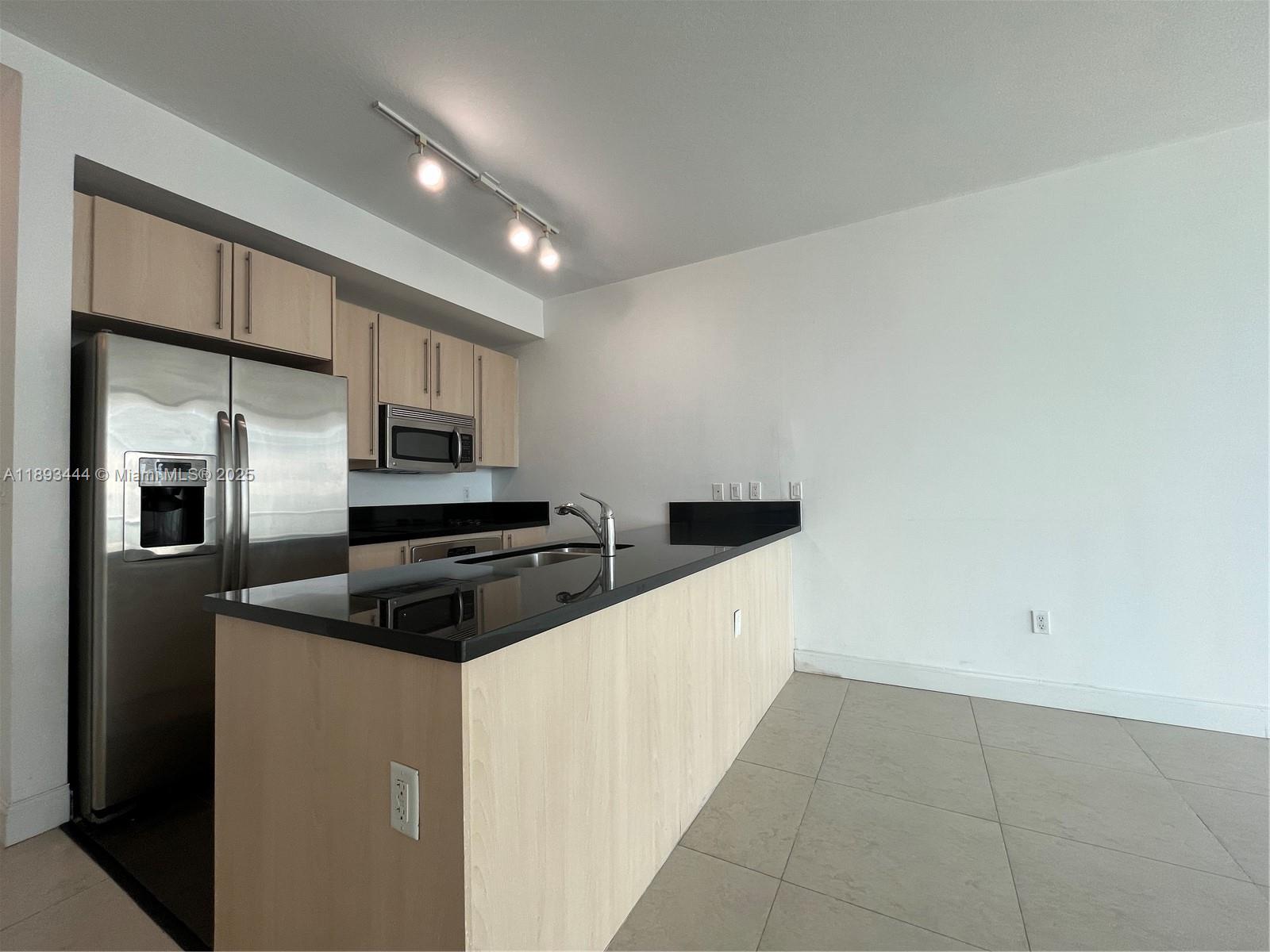 THE AXIS ON BRICKELL COND - Residential Lease