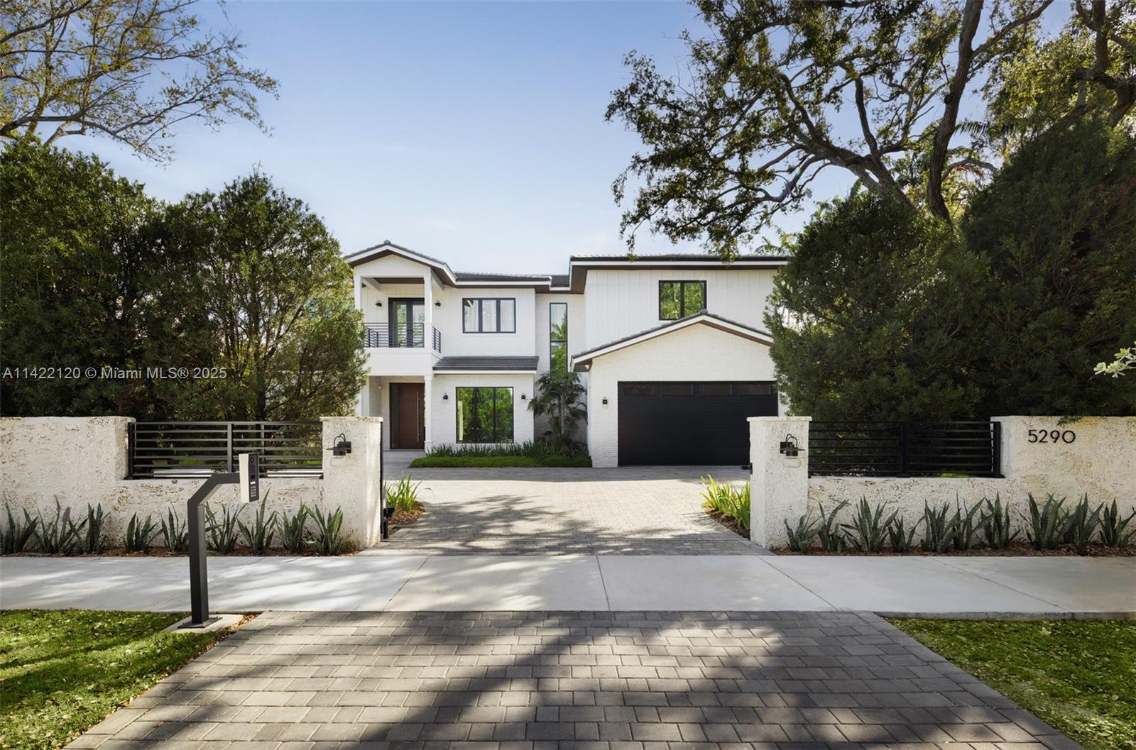 Behind a stunning privacy wall in idyllic Ponce Davis sits a dreamy 6 bed/7 bath Modern Farmhouse. Built by award -winning Hollub Group, this stunning turnkey home offers the perfect blend of contemporary luxury and charming elegance.You'll find comfort and tranquility in every corner of this home, with flex spaces, a luxurious primary suite, all ensuite bedrooms & great entertaining & living spaces, highlighted by custom designs & finishes. High ceilings & natural light create an inviting atmosphere that seamlessly integrates the indoors w/ outdoors, overlooking the pool, summer kitchen & loggia. Thoughtfully curated custom gourmet kitchen with Sub-Zero & Wolf. This suburban retreat is an escape to a life of comfort, sophistication, & convenience. Elevator, generator. Available Q4/2024